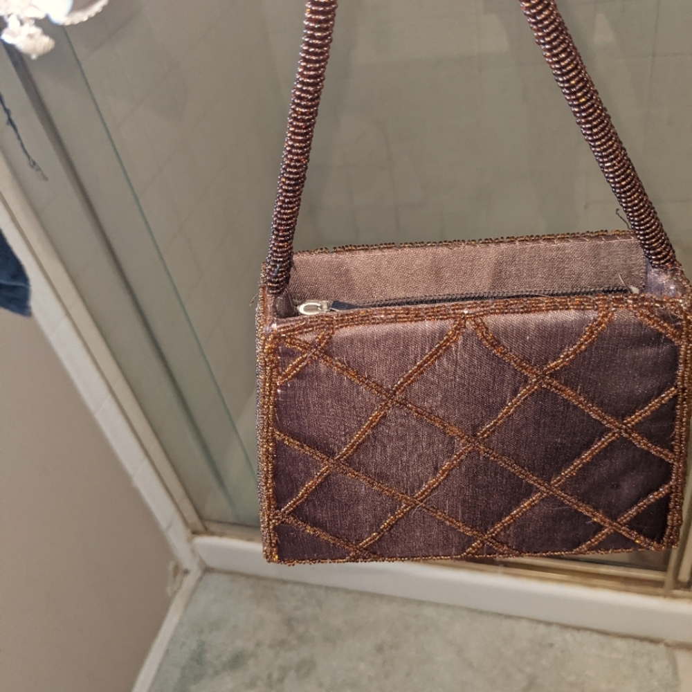 Embellished evening bag.  Brown small bag with brown beads that sparkle.